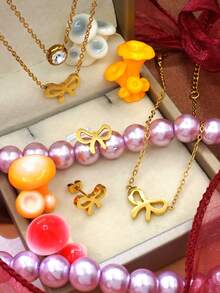 Conjunto de collar, pulsera y pendientes con colgante de lazo hueco, joyería elegante como regalo para mujeres, adecuado para aniversario, cita, cumpleaños, Día de San Valentín, Día de la Madre, regreso a clases, ceremonia de graduación y fiesta - Multicolor - Ver 8