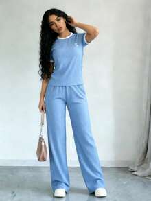 Set de 2 piezas para mujer con camiseta de manga corta de unicolor y pantalones con cordón en la cintura, estilo casual - Celeste - Ver 4