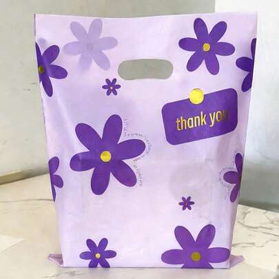 100 piezas Bolsas de compras de plástico con flores moradas, bolsas minoristas premium con asas troqueladas en relieve - Flores moradas, bolsas de regalo con estampado de margaritas moradas con etiqueta/firma de agradecimiento - Bolsas de compras florales reutilizables en rosa y morado