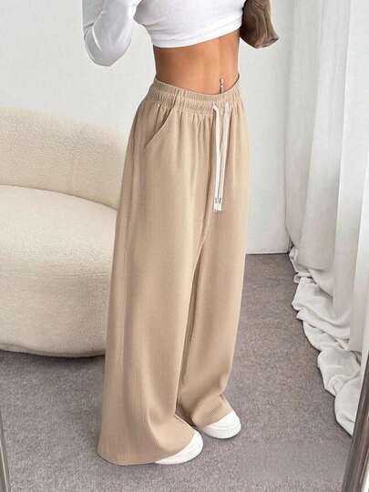 Pantalones deportivos casuales de unicolor y textura de pana para mujer