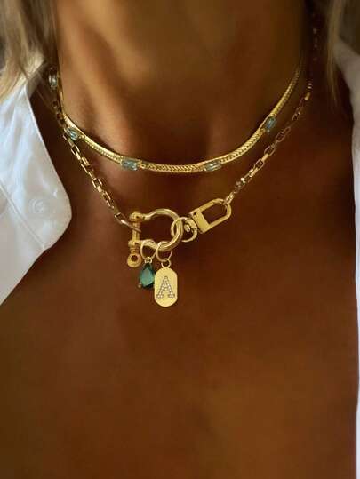 1pc Gold Letter Pendant Necklace With Green Diamond Charm, Stainless Steel Chain. Suitable For Decoration And Wearing In Work, Daily Life, Party, Banquet And Ball. This Is A Unique And Luxurious Women's Necklace.