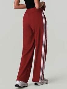 Quần jogger thể thao nữ cạp cao dáng rộng, có sọc bên hông và túi hai bên. - Cam đỏ - Xem 10