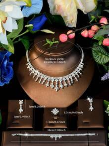 4件套优雅银色立方氧化锆（CZ）渐变流苏项链、配套耳坠、花朵簇拥戒指和点缀网球手链首饰套装，高级立方氧化锆新娘精美首饰，完美适用于婚礼、订婚、晚宴、正式宴会、特殊场合和送礼。 - 銀色 - 查看 8