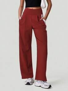 Quần jogger thể thao nữ cạp cao dáng rộng, có sọc bên hông và túi hai bên. - Cam đỏ - Xem 8