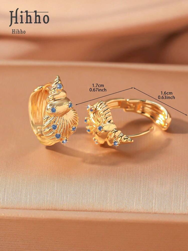 一对清新海洋风贝壳耳环，采用贝壳图案设计，结合3D立体质感和蓝色锆石，散发夏日气息，适合度假、甜美时尚或休闲风格。 - 海螺耳環 - 查看 6