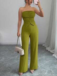 Conjunto de top elegante y pantalón largo, look minimalista de oficina, con top satinado y sexy para fiestas. Conjunto de mujer con pantalón verde ajustado con cremallera, sin mangas - Verde - Ver 1