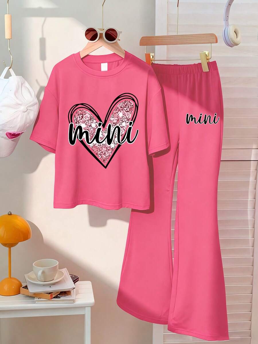 Bộ 2 món gồm áo thun ngắn tay dáng rộng và quần short, thích hợp cho học sinh, thể thao, hoạt động ngoài trời và mùa hè. - Màu Hồng Tươi - Xem 1