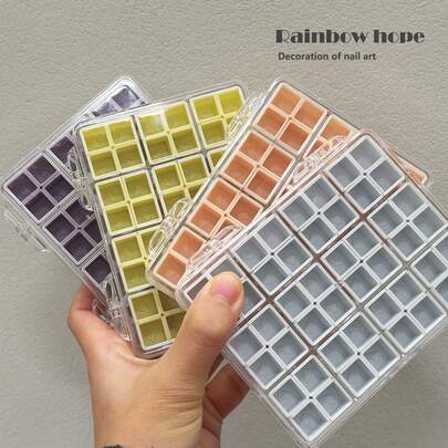 48格彩色美甲珍珠饰品收纳盒 - 实用便携，轻松收纳。这款收纳盒是整理和分类美甲工具的理想之选。易于拆卸和取出。多种颜色可选，方便搭配。可收纳小珍珠和树脂美甲配件。适合美甲沙龙和美甲爱好者使用，用于制作美甲贴纸、短指甲装饰等。