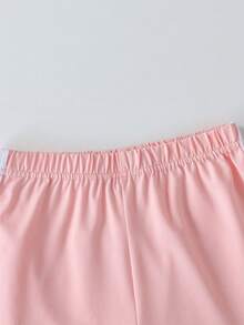 一套少女圆领T恤短裤套装，包含一件彩色蝴蝶印花短袖T恤和一条短裤，舒适简约设计，适合春夏穿着。 - 彩色 - 查看 10