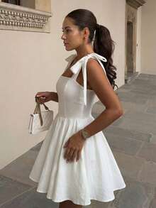 Đầm hai dây không tay màu trơn dáng suông HoloChill 2026 dành cho nữ, kiểu dáng thường ngày, mẫu mới mùa hè, thắt nơ phía trước với eo nhún, đầm hè cho nữ, đầm đi nghỉ mát, đầm dự tiệc thanh lịch, đầm đi biển, đầm dự đám cưới, trang phục ngoài trời, đầm sinh nhật, đầm duyên dáng, đầm đi nghỉ mát biển, đầm thường ngày cho nữ. - trắng - Xem 7