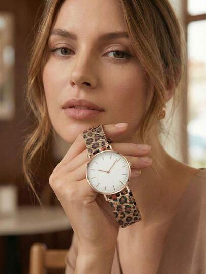 1件装女士时尚创意石英表，金属表壳黑色表盘腕表，女士奢华玫瑰金指针和刻度，豹纹金属网状表带腕表，时尚石英女士腕表，适合日常休闲佩戴，时尚百搭，可作为生日礼物、圣诞礼物、情人节礼物、母亲节礼物、节日礼物送给女性。