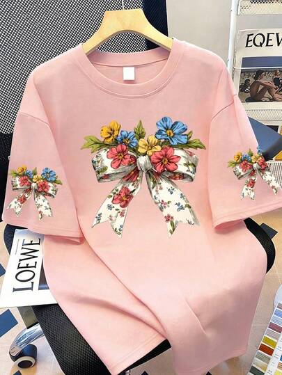 大码女式花卉蝴蝶结印花圆领T恤，适合夏季度假、海滩、情人节、母亲节礼物、日常穿着、外出、节日、海滩、派对、生日、聚会、学校、音乐节、通勤、健身、婚礼、外套等场合。