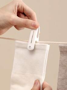 12pcs Seamless Windproof Clips, Plastic Clothespins For Hanging Clothes, Socks, Prevent Fading During Drying - 12-piece Pack - View 5