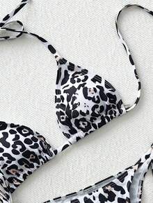 Bộ bikini 3 món dành cho nữ, họa tiết hoa nhiệt đới và da báo, kiểu dáng thanh lịch, gợi cảm, kèm váy lãng mạn, thích hợp cho kỳ nghỉ hè, đi biển và dự tiệc. - Nhiều màu - Xem 5