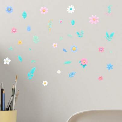 1张夜光花朵贴纸。图案包含各种颜色和形状的花朵、叶子等。这款夜光贴纸在黑暗环境中会发出荧光，增添趣味性。适用于装饰客厅、卧室、书房等多种场景。