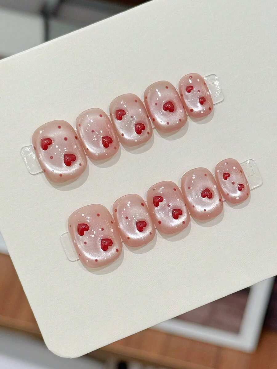10片纯手工制作的按压式美甲贴片，短款椭圆形美甲贴片，粉色美甲贴片，可爱甜美的心形裸粉色猫眼图案，饰有3D红色爱心，手绘波点，简约柔和的按压式美甲贴片，适合女性和女孩，春夏秋冬节日派对和日常生活使用。 - 粉色 - 查看 1