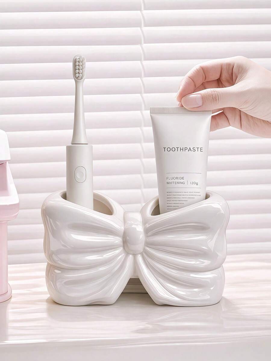 Giá đựng bàn chải đánh răng và kem đánh răng kiểu Bắc Âu hình nơ (1/2 chiếc), dụng cụ sắp xếp đồ dùng phòng tắm trên mặt bàn. - Giá đỡ bàn chải đánh răng hình nơ - Xem 1