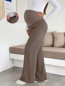 Quần/váy bầu màu kaki dệt kim co giãn cao, ống rộng, thoải mái, kiểu dáng công sở thường ngày, có chi tiết cúc cài. - Màu Khaki - Xem 6