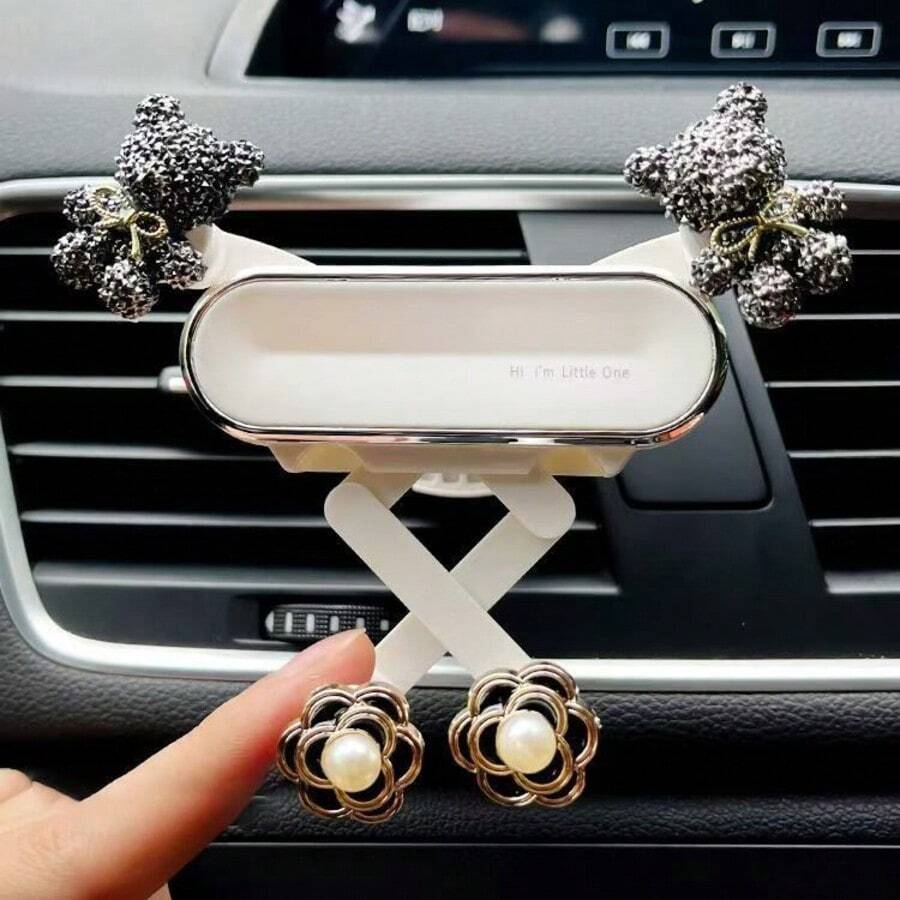 1个熊形车载出风口手机支架，车载手机支架，车载导航支架