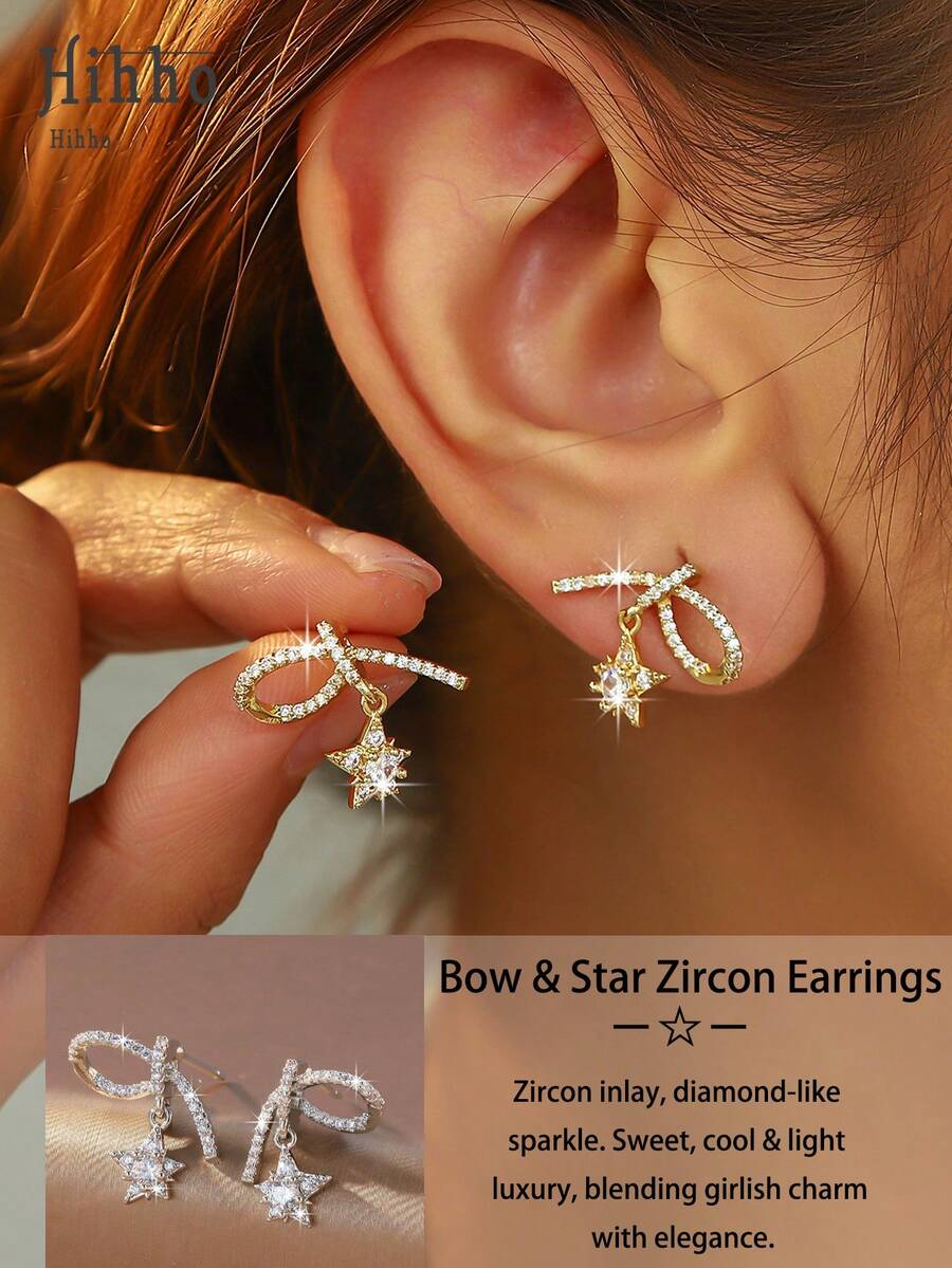 Hihho 一对闪耀的锆石蝴蝶结耳环，璀璨如钻。融合甜美、清爽与奢华，兼具少女的妩媚与优雅，时尚的耳环饰品适合约会、派对等轻松的社交场合，也可搭配甜美或略带成熟气息的服饰。 - 蝴蝶結 - 查看 1
