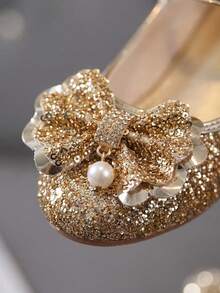 1 paire de talons hauts dorés pour filles 2026, chaussures de princesse élégantes, décorées d'un nœud doré et de strass pailletés, convenant pour les banquets, bals, mariages, fêtes, représentations, rassemblements familiaux et sorties - Doré - Voir 4