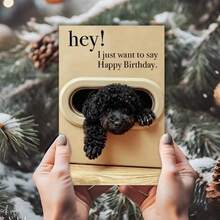 一张精美的生日贺卡，上面印有可爱的动物图案，是送给朋友、家人或同事的独特生日礼物。贺卡上，一只可爱的黑色卷毛小狗正从椭圆形的小孔里探出头来。 - 彩色 - 查看 7