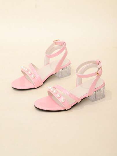 A Pair Of The Latest Summer Pearl Accessory High-Heeled Girls' Sandals, In The Roman Style, Specially Designed For Children - Fashionable, Casual, Comfortable And Elegant. It Is An Ideal Choice For Shopping In The Mall, Daily Outings, Party Events And Dance Performances, And Can Be Easily Matched With Various Children's Clothing.