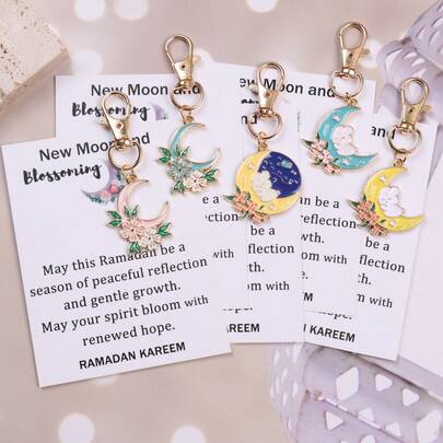 Set de regalo de 5 piezas con luna nueva y flores para Ramadán, conjunto de llaveros con luna nueva y flores para Eid Mubarak con tarjeta exclusiva de bolsillo "Que tu espíritu florezca con esperanza". Simbolizando esperanza y crecimiento, regalo conmemorativo creativo de Eid/Ramadán y regalo espiritual para familiares, amigos, seres queridos y colegas.