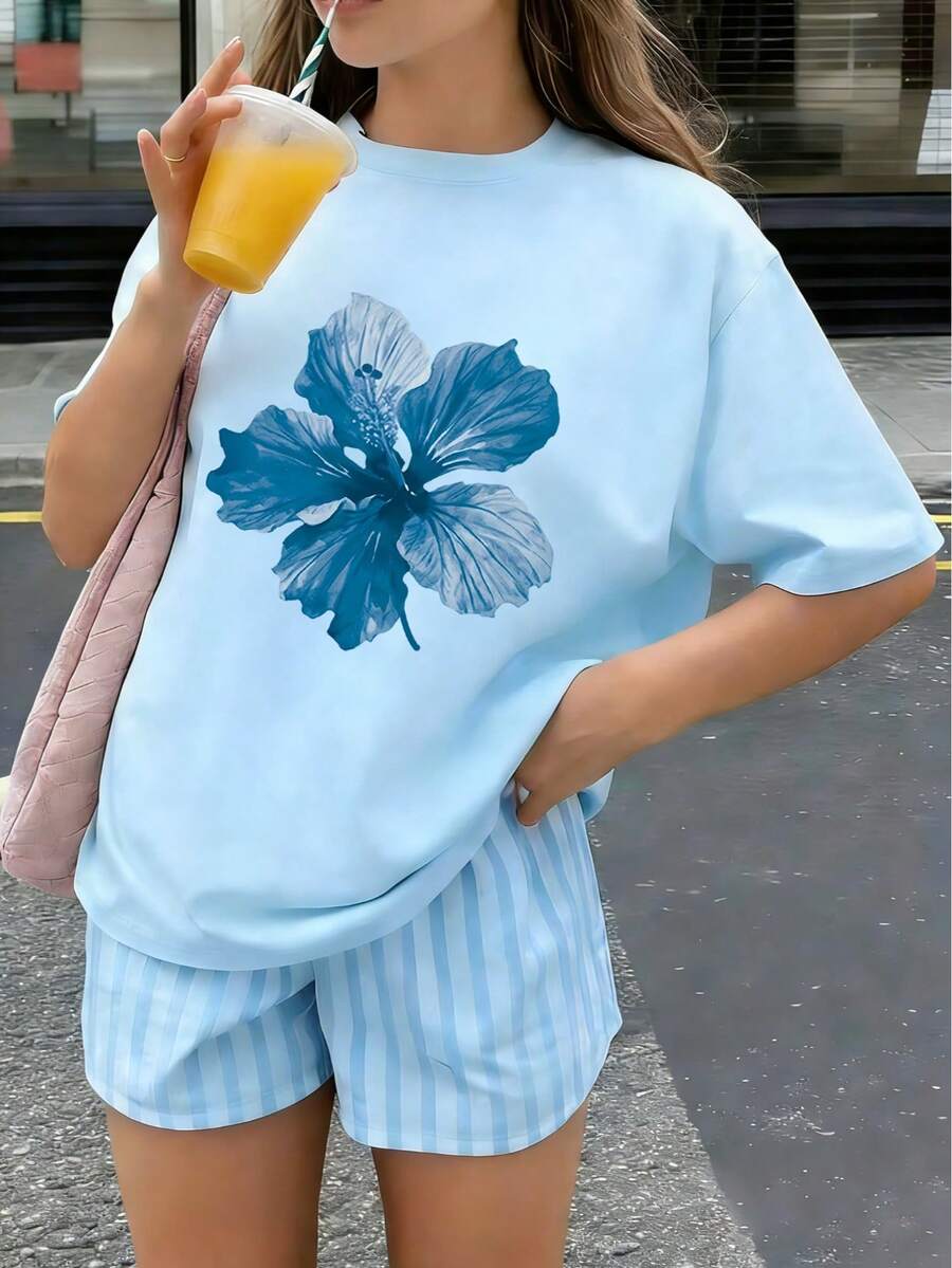 Camiseta con estampado floral tropical azul para niña preadolescente, de tela suave y cómoda, adecuada para que las niñas la usen para viajar, vacaciones, deportes al aire libre, uso diario, viajes casuales, ¡la mejor opción! Parte superior casual y versátil de moda para niñas preadolescentes en primavera y verano - Celeste - Ver 1