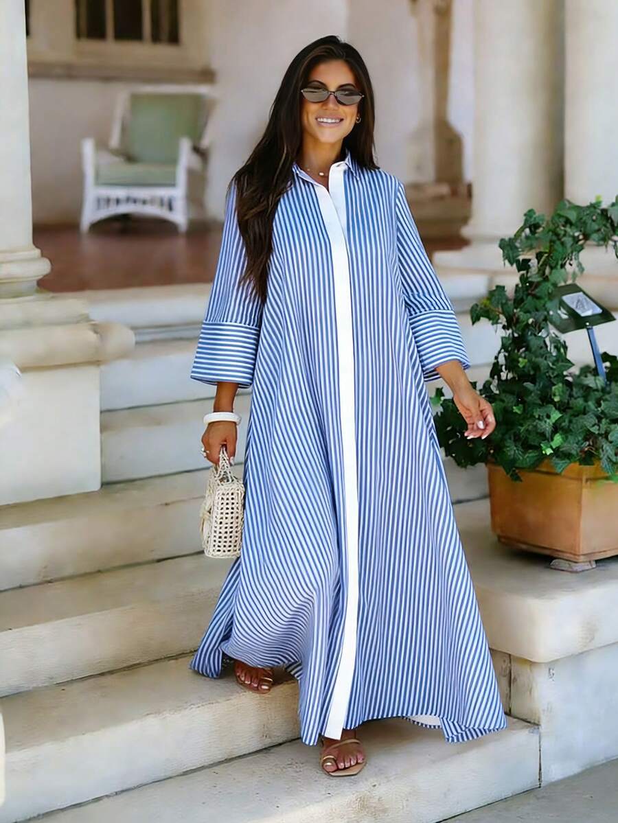 春夏新款时尚女式彩色条纹衬衫裙，休闲百搭风格，适合日常出行和度假，正面中央撞色纽扣细节，A字喇叭裙摆，优雅迷人。