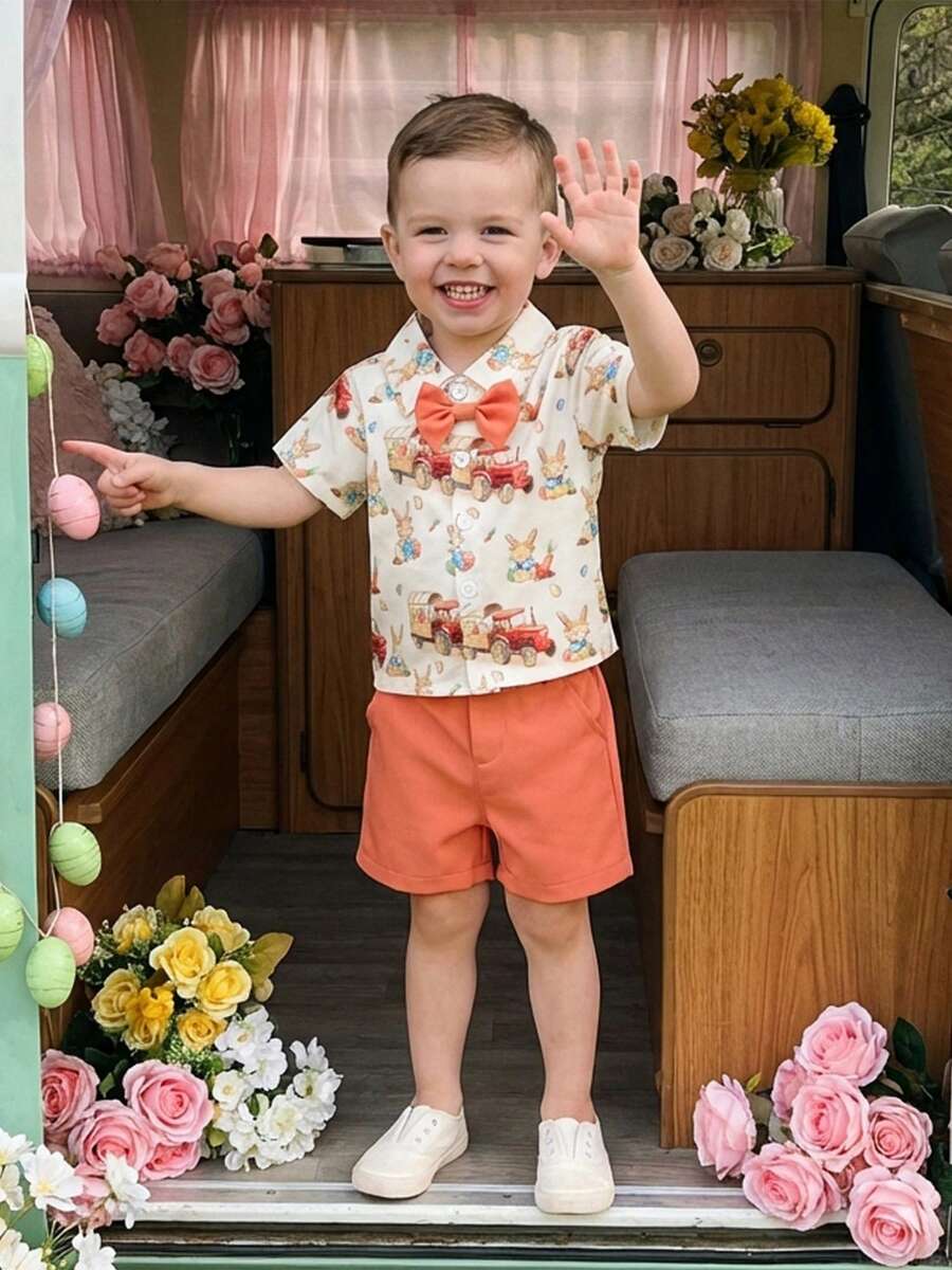 Conjunto de 2 piezas de Pascua para niños, con estampado de huevos de conejito de verano, top de manga corta con cuello vuelto y pantalones cortos - Naranja - Ver 1
