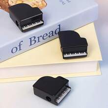 1个钢琴造型削笔器，高品质，时尚美观，适合作为办公室和家庭的迷你文具，由PANDABOYBOY出售。 - 彩色 - 查看 7