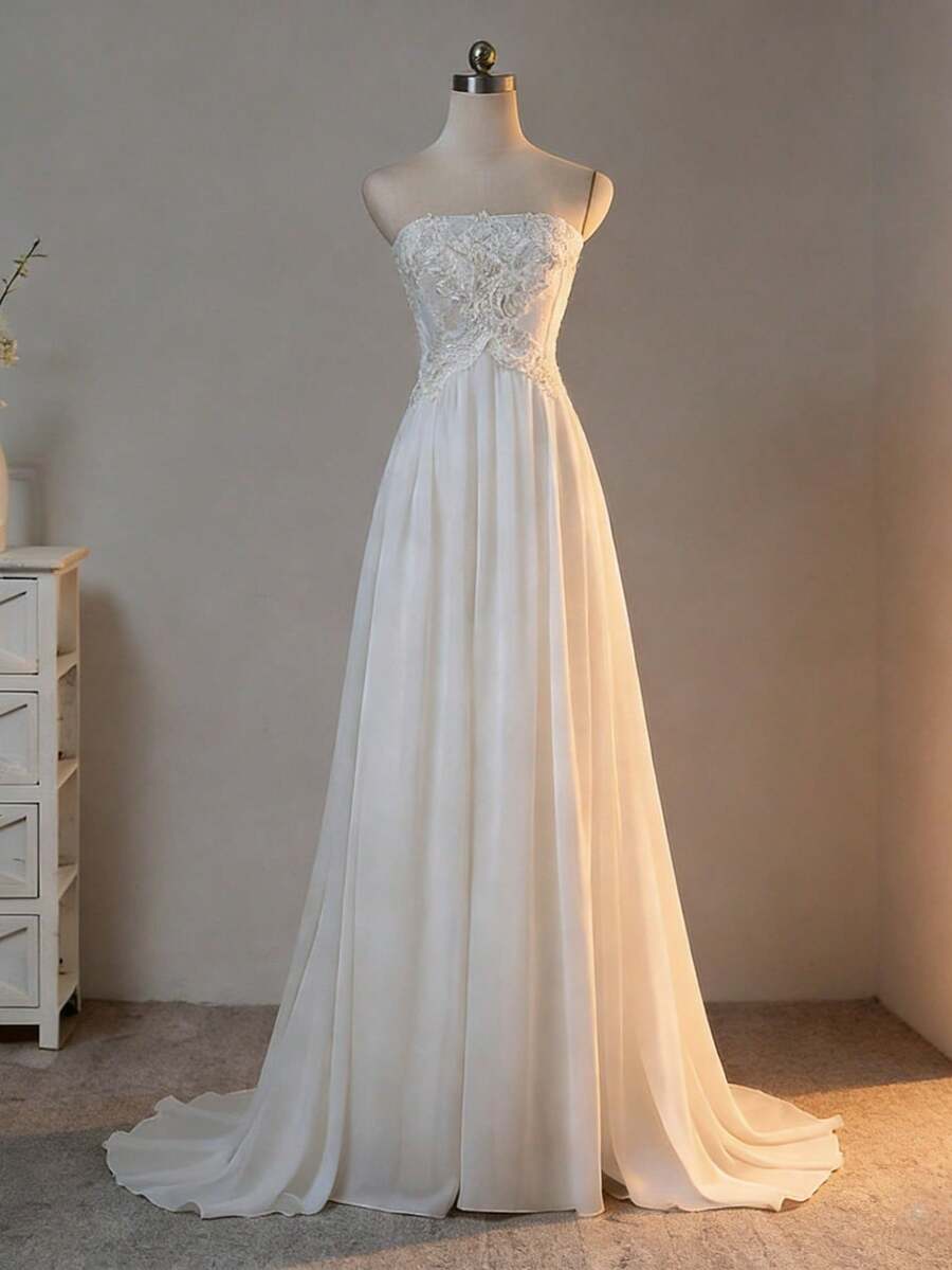 Glamorous Strapless A-Line Wedding Dress With Open Back In Chiffon – Sophisticated Floor-Length Bridal Gown Featuring A Flattering Corset Bustier, Daring Backless Design, And Flowing Chiffon Silhouette, Perfect For Weddings, Christmas Galas, Halloween Balls, Formal Dances, Birthday Celebrations, And Special Evening Events. A Versatile Choice For Wedding Receptions, Holiday Parties, Anniversary Dinners, Resort Getaways, Black-Tie Occasions, Cocktail Gatherings, Bridal Showers, Wedding Guest Attire, Graduation Formals, Homecoming Events, And As A Modern Bridesmaid Or Festive Evening Gown. - trắng - Xem 1