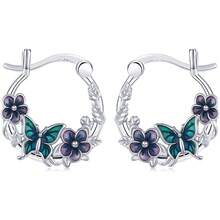 Mariposa y flor