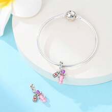 这款镀银吊坠以“美甲时尚”为主题，整体风格梦幻柔美。其精致甜美的造型散发着现代时尚气息。这款吊坠可与同系列的同款手链和项链搭配，打造个性化的DIY珠宝。 - 彩色 - 查看 4