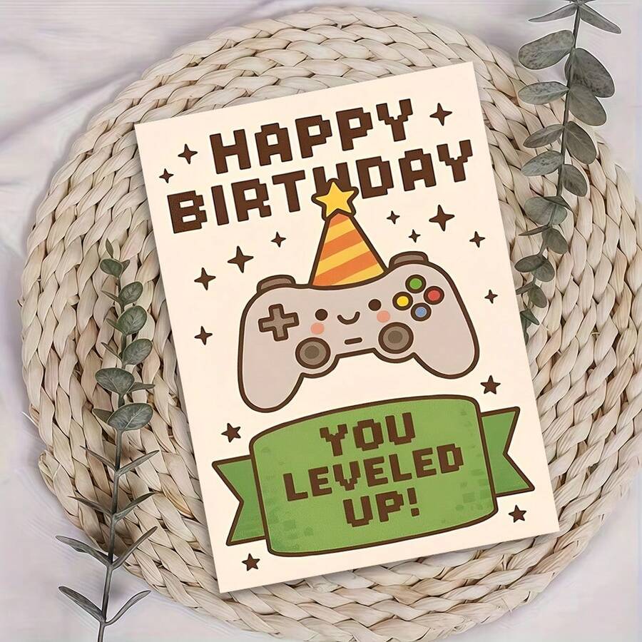 1张“游戏玩家生日快乐，你升级啦！”生日贺卡，欢快庆祝卡片——奶油色背景，像素艺术风格，俏皮插画，可爱的游戏手柄戴着派对帽，趣味十足的“你升级啦！”祝福语，附信封，内页空白，可供个人留言。 - 單件 - 查看 1