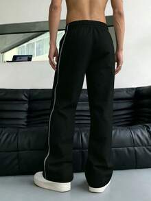 男士宽松休闲裤，简约街头风日常穿着，喇叭裤腿运动裤，适合户外、健身、跑步，春秋季穿着。 - 黑色 - 查看 3