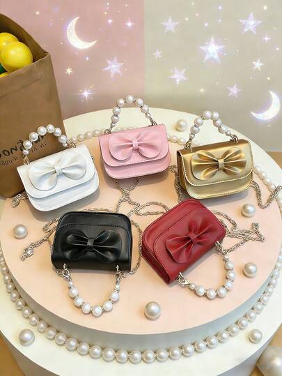 1pc This Stylish Mini Bow And Pearl Handbag Features A Pu Magnetic Closure. Its Unique Design Makes It A Versatile And Chic Shoulder/Crossbody Bag Suitable For Everyday Use. Available In Multiple Colors, This High-Quality Bag Is A Must-Have Fashion Item And Also Makes A Perfect Gift For A Friend.