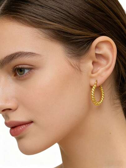 Un par de elegantes pendientes con forma de alambre retorcido, pendientes de acero inoxidable para damas, pendientes con tono dorado, pendientes circulares, adecuados para usar durante todo el año, hacen un regalo perfecto para amigas.