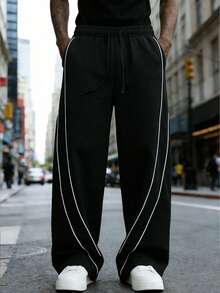 Calça esportiva masculina casual, folgada, com pernas largas e modelagem jogger. Calça de moletom masculina, calça comprida. Adequada para uso interno e externo, confortável e estilosa, presente ideal para casais. Com cintura ajustável por cordão. Presente perfeito para o Dia dos Pais. - Preto - Ver 4