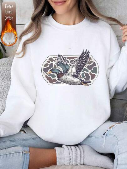 Moletom feminino oversized de algodão com estampa animal, tecido grosso e quente, modelagem solta e gola redonda, ideal para clima frio, outono/inverno.