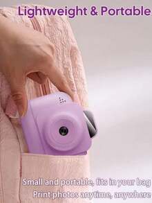 儿童相机套装包含：1 台带即时打印功能的相机、2.4 英寸高清屏幕、16 倍数码变焦、1080P 视频录制、MP3 播放器、20 款相框和 5 款滤镜、4 种镜像效果、3 卷打印纸、USB Type-C 充电线、相机背带、趣味可定制涂鸦打印功能、1300mAh 大容量电池 - 彩色 - 查看 9