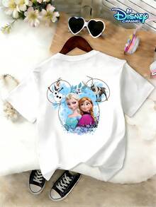 This Disney Frozen Collaboration T-Shirt And Shorts Set For Girls Aged 4-12 Features A White Crew Neck Short-Sleeved Top With A Watercolor Floral "Disney" Logo On The Front And A Combination Of Elsa, Princess Anna, Olaf, And Sven On The Back. The Prints Are Clear And Fade-Resistant. It Comes With Pink Elastic-Waisted Shorts Featuring A Combination Print Of Frozen Characters And Mickey Mouse Head Frames On The Sides. The Shorts Are Soft, Skin-Friendly, Breathable, And Washable. This Two-Piece Set Offers Effortless Style And Is Suitable For Everyday Wear To School, Weekend Outings, Casual Relaxation At Home, And Outdoor Play, Meeting Children's Diverse Dressing Needs. It's An Excellent Choice For Mothers Looking For A Stylish Outfit For Their Daughters. - White Top + Pink Shorts - View 2