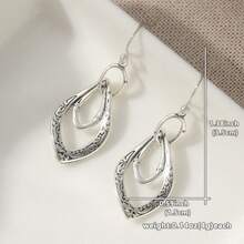 一对复古简约风格银色镂空雕刻耳环，古典艺术风格，展现女性优雅气质，是节日礼物的理想之选。 - 銀色 - 查看 7