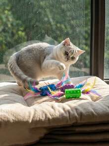 1 pieza Juguete realista de plumas para gatos, hecho de fibra de poliéster con campana incorporada, alivio del estrés, adecuado para gatos de todas las edades, sin batería - Multicolor - Ver 1