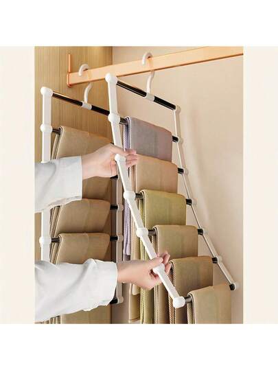 1 ชิ้น ไม้แขวนเสื้อแบบพกพาอเนกประสงค์ - ที่จัดระเบียบกางเกงแบบแขวนทรงบันไดอเนกประสงค์เพื่อประหยัดพื้นที่อย่างมีประสิทธิภาพ เหมาะสำหรับกางเกงเดรส กางเกงยีนส์ กระโปรง และอื่นๆ - ดีไซน์คลิปสเตนเลสสตีลสำหรับจัดเก็บแบบไม่ทิ้งรอย - เหมาะสำหรับการปรับปรุงตู้เสื้อผ้าฤดูใบไม้ผลิและฤดูร้อน โอบรับสไตล์มินิมอล