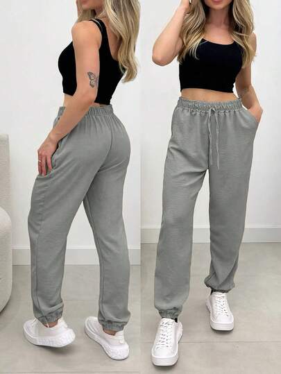 Quần dài ống rộng màu trơn, có dây rút và túi, kiểu dáng thường ngày, đa năng.