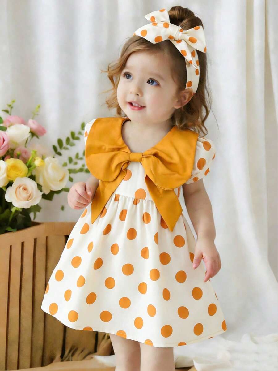Vestido de verano para bebé niña con lunares amarillos y gran lazo - Amarillo - Ver 1
