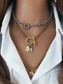 一套双色马蹄锁字母吊坠项链，包含一条独立的辟邪眼吊坠项链和一条短项链。呈现优雅复古美感，适合作为日常时尚配饰。 - 彩色 - 查看 1