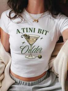 Women'S Funny "A Tini Bit Older" Martini Graphic Cropped T-Shirt - Lightweight Breathable Casual Short Sleeve Top With Green Olive & Lemon Print, Relaxed Fit For Casual Attire, Parties & All-Season Outfits - Humorous Statement Tee, Women's Crop Top Tee - Chic Basic - trắng - Xem 2
